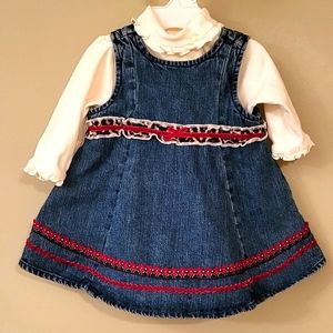 Two piece set includes denim jumper dress and ivory long sleeved onesie/bodysuit